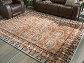 Leasing Furniture - Ashley Furniture - Qaabiz Rug - 7'8" x 10' Area Rug / Sienna/Ivory/Black - R407521