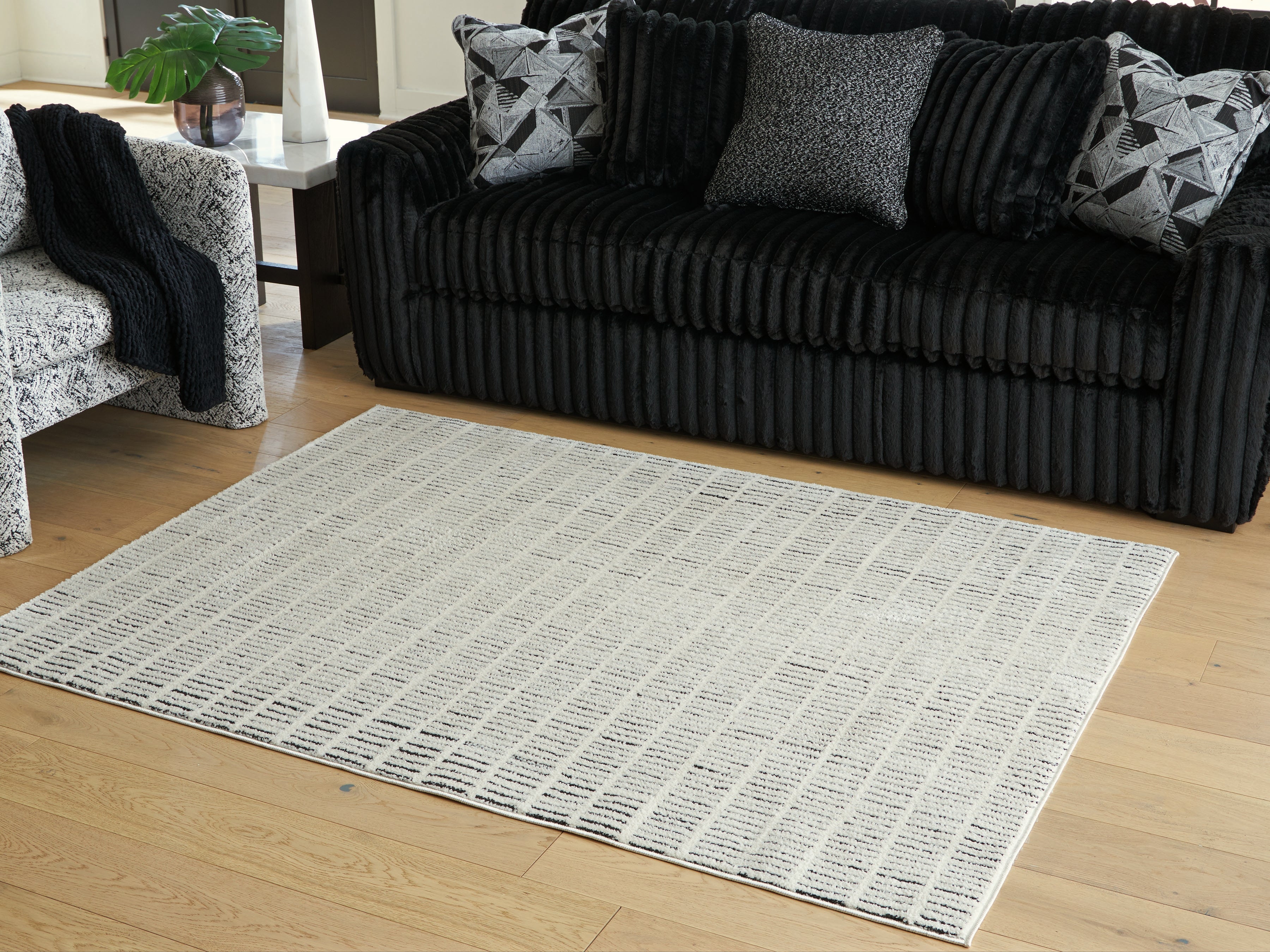Leasing Furniture - Ashley Furniture - Turinwith Rug - 5'3" x 7' Area Rug / Ivory/Black - R407552