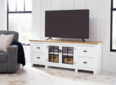 Leasing Furniture - Ashley Furniture - Ashbryn 74" TV Stand - 74" / White/Natural - W844-68