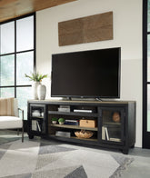 Leasing Furniture - Ashley Furniture - Foyland 83" TV Stand - 83" / Black/Brown - W989-68