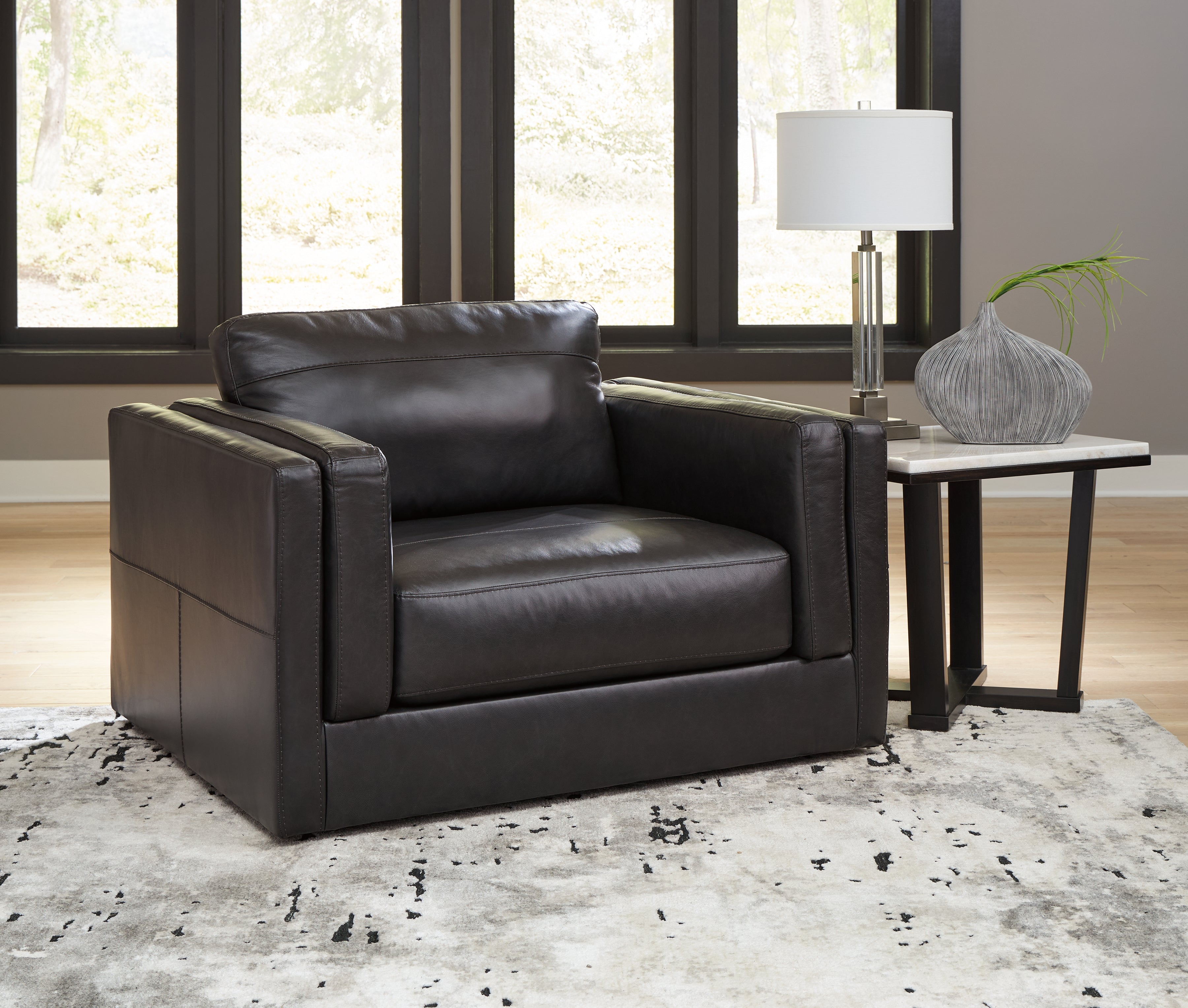 Leasing Furniture - Ashley Furniture - Amiata Living Room - Chair and a Half / Onyx - 5740523