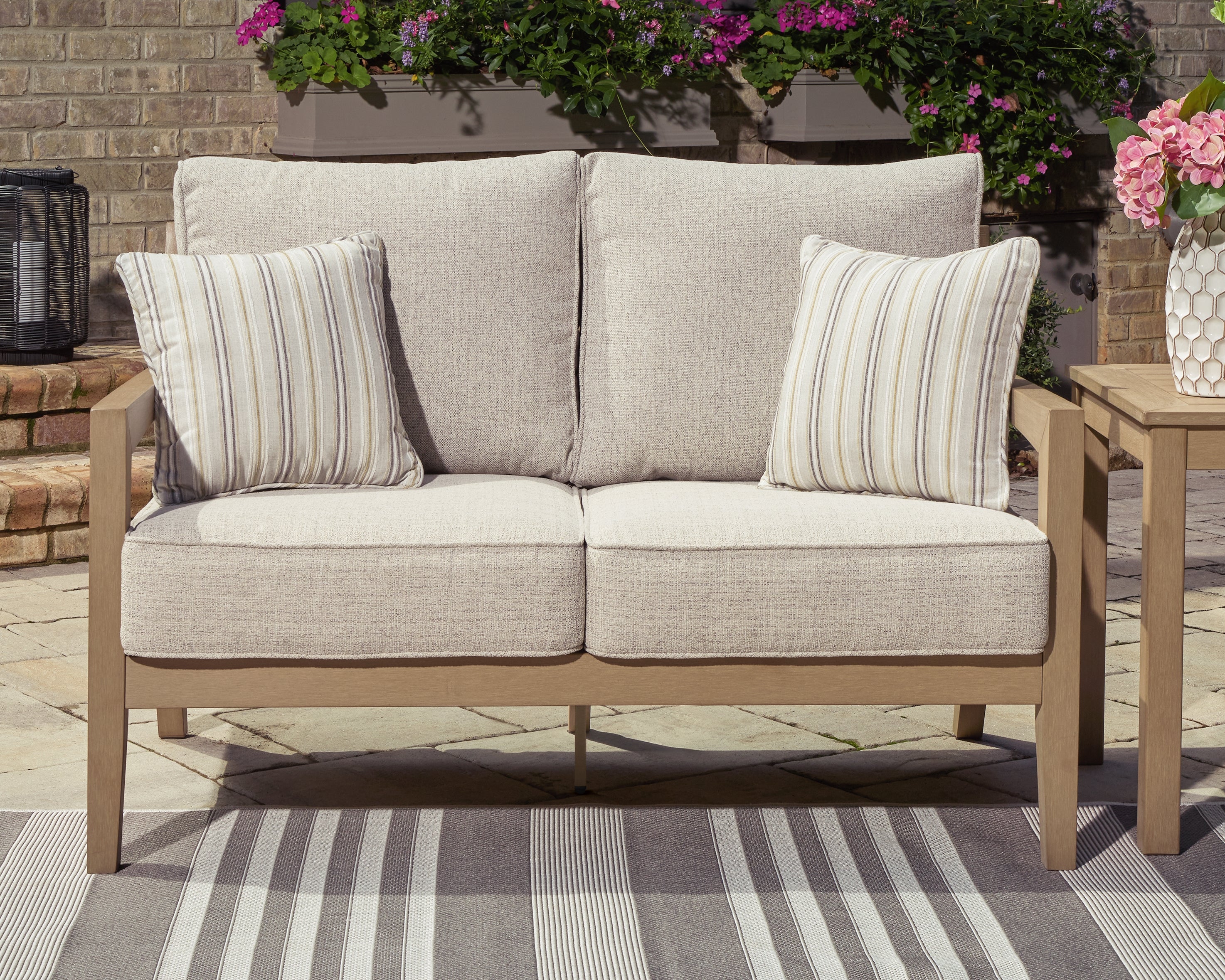Leasing Furniture - Ashley Furniture - Hallow Creek Outdoor - Loveseat w/Cushion / Driftwood - P560-835