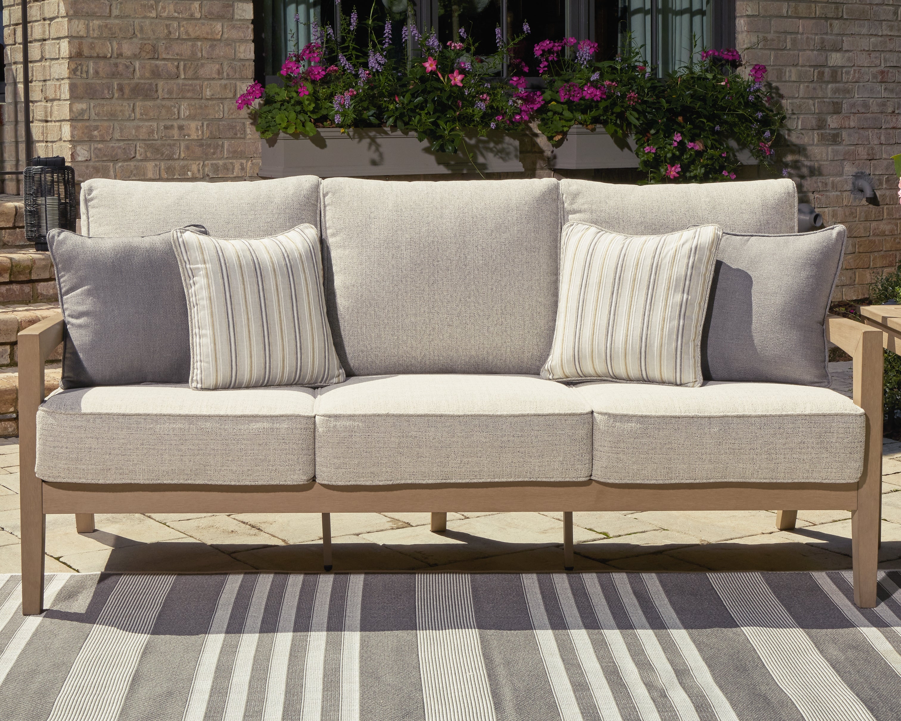 Leasing Furniture - Ashley Furniture - Hallow Creek Outdoor - Sofa with Cushion / Driftwood - P560-838