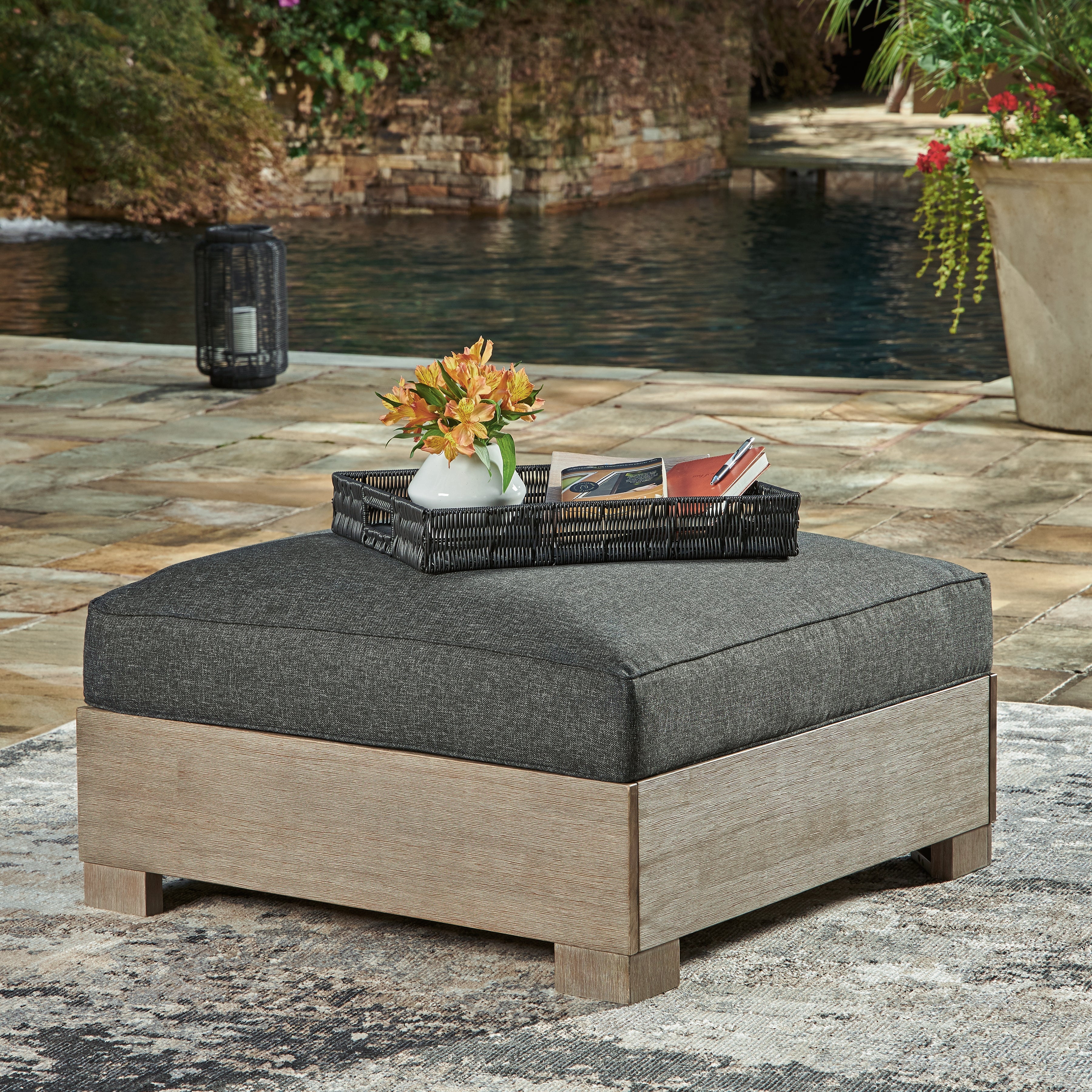 Leasing Furniture - Ashley Furniture - Citrine Park Outdoor - Ottoman with Cushion / Brown/Charcoal - P660-814