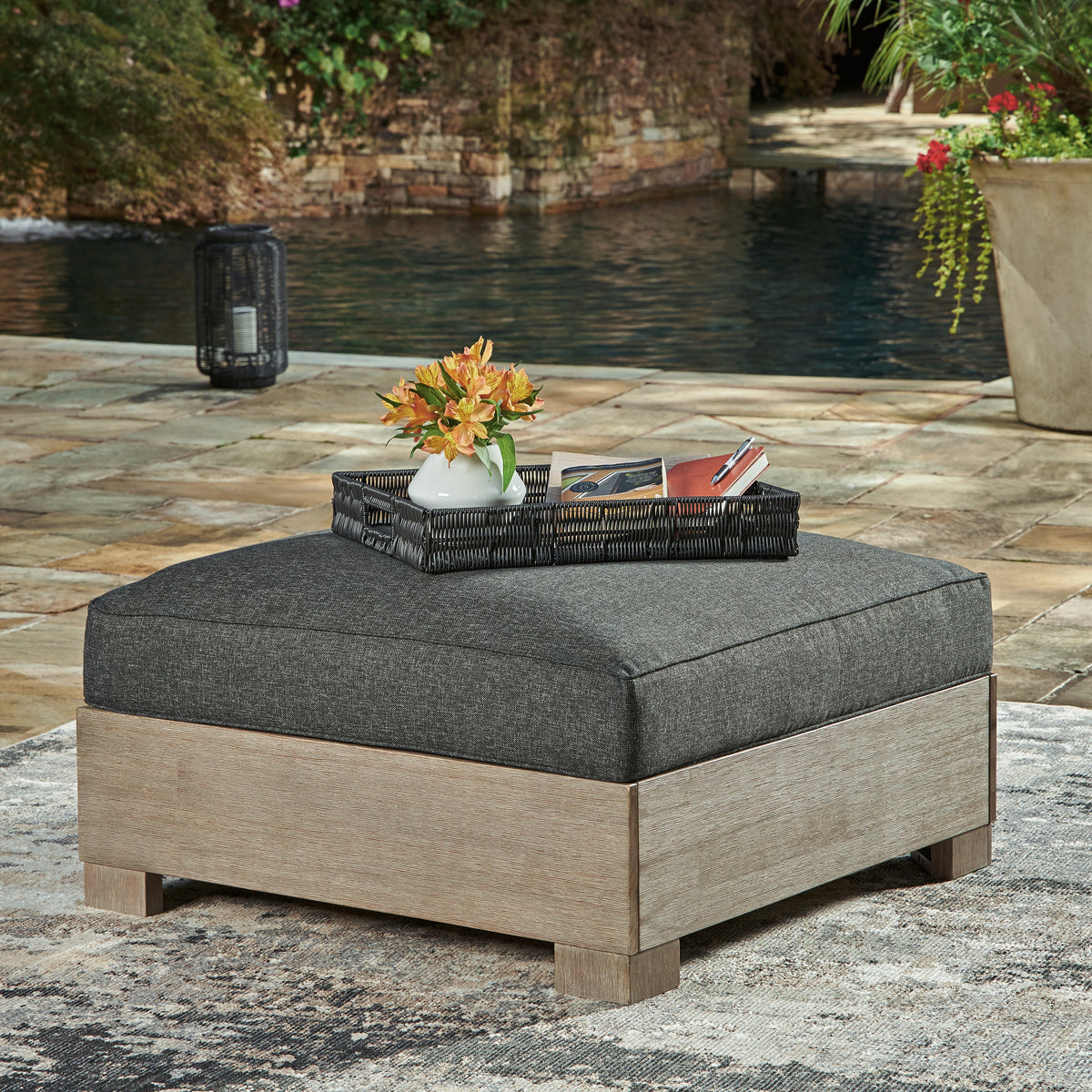 Leasing Furniture - Ashley Furniture - Citrine Park Outdoor - Ottoman with Cushion / Brown/Charcoal - P660-814