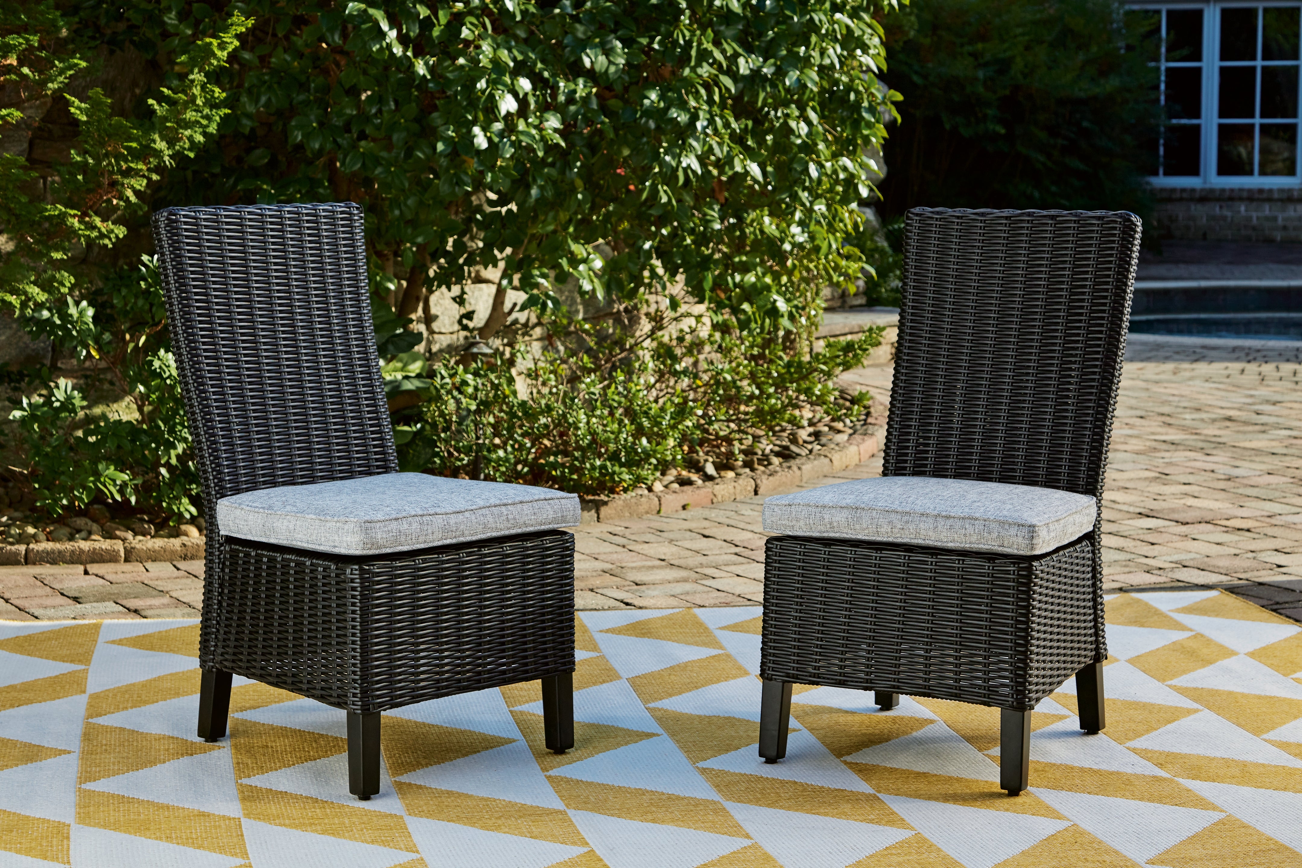Leasing Furniture - Ashley Furniture - Beachcroft Outdoor - Side Chair with Cushion (Set of 2) / Black/Light Gray - P792-601