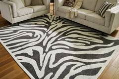 Leasing Furniture - Ashley Furniture - Thomwith Rug - 8' x 10'2" Washable Rug / Black/Ivory - R406291