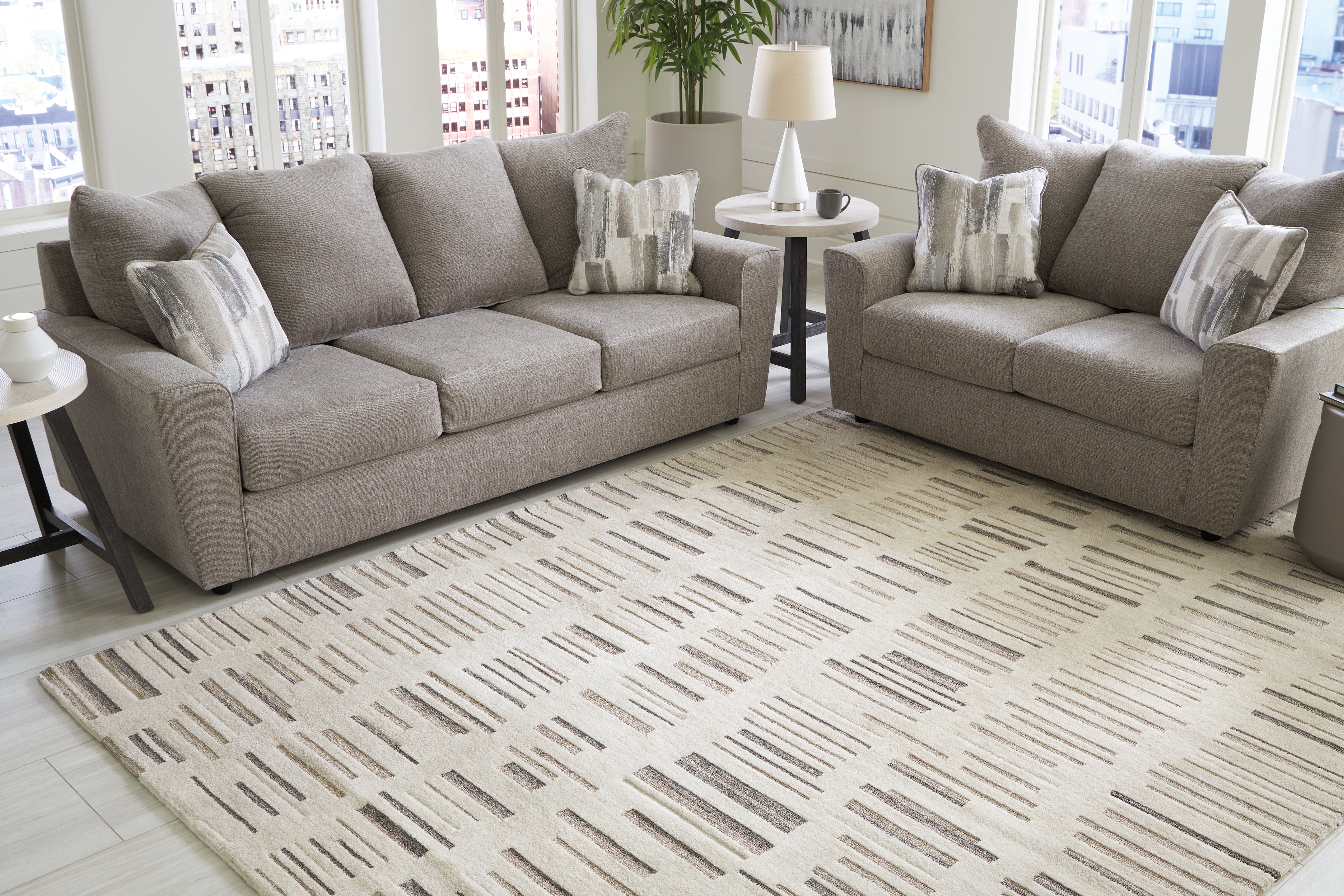 Leasing Furniture - Ashley Furniture - Leesdale Rug - 8' x 10' Rug / Ivory/Brown/Black - R406421