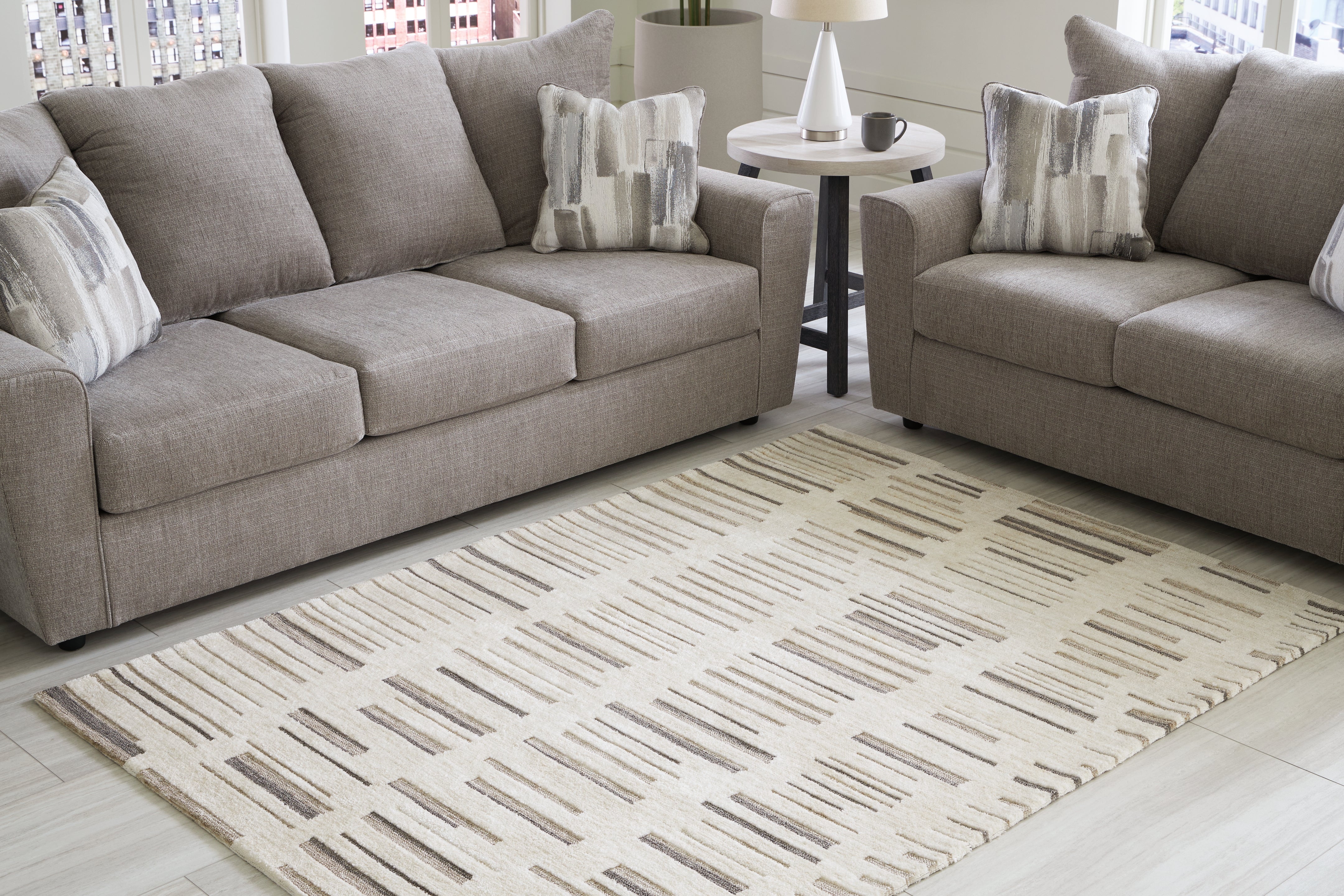 Leasing Furniture - Ashley Furniture - Leesdale Rug - 5' x 7' Rug / Ivory/Brown/Black - R406422