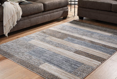 Leasing Furniture - Ashley Furniture - Sethburn Rug - 5' x 7' Rug / Cream/Brown/Gray - R406592