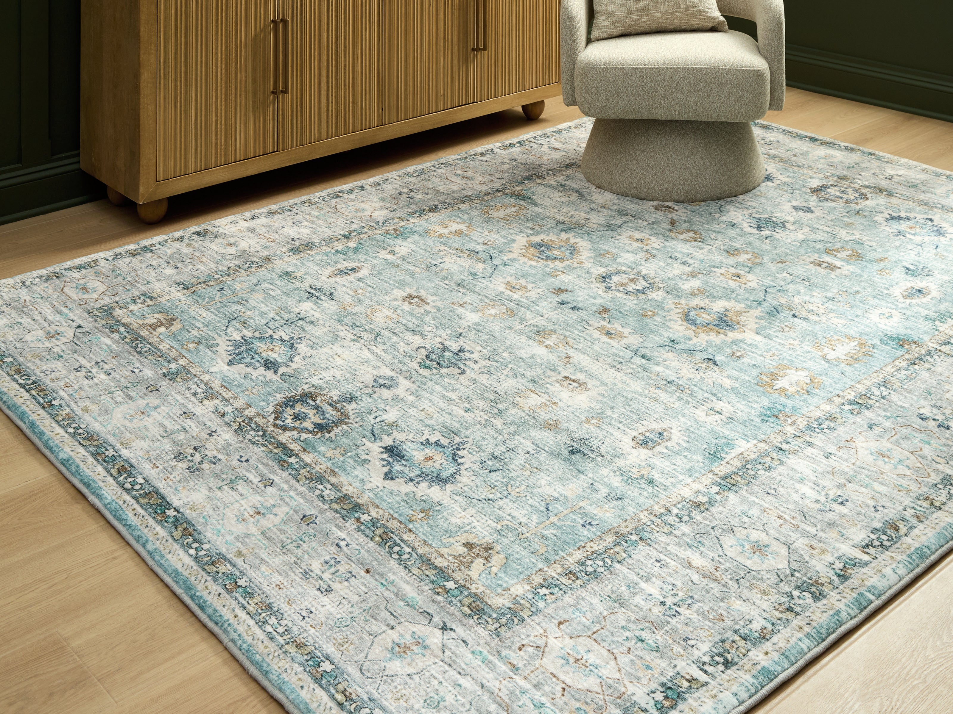 Leasing Furniture - Ashley Furniture - Ladstoney Rug - 7'6" x 9'6" Area Rug / Teal/Beige/Ochre - R407501