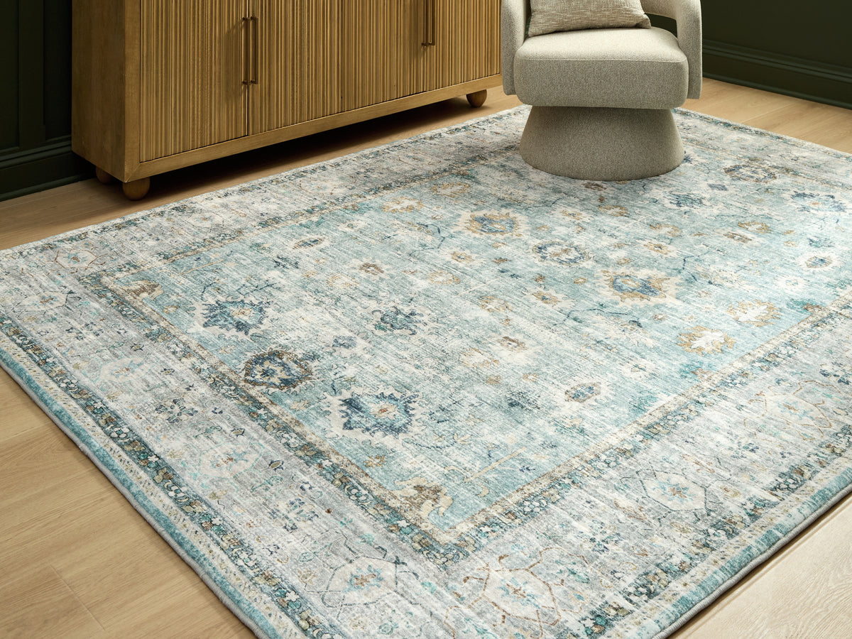 Leasing Furniture - Ashley Furniture - Ladstoney Rug - 7'6" x 9'6" Area Rug / Teal/Beige/Ochre - R407501