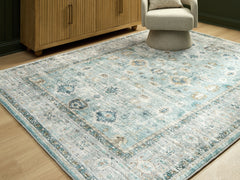 Leasing Furniture - Ashley Furniture - Ladstoney Rug - 7'6" x 9'6" Area Rug / Teal/Beige/Ochre - R407501