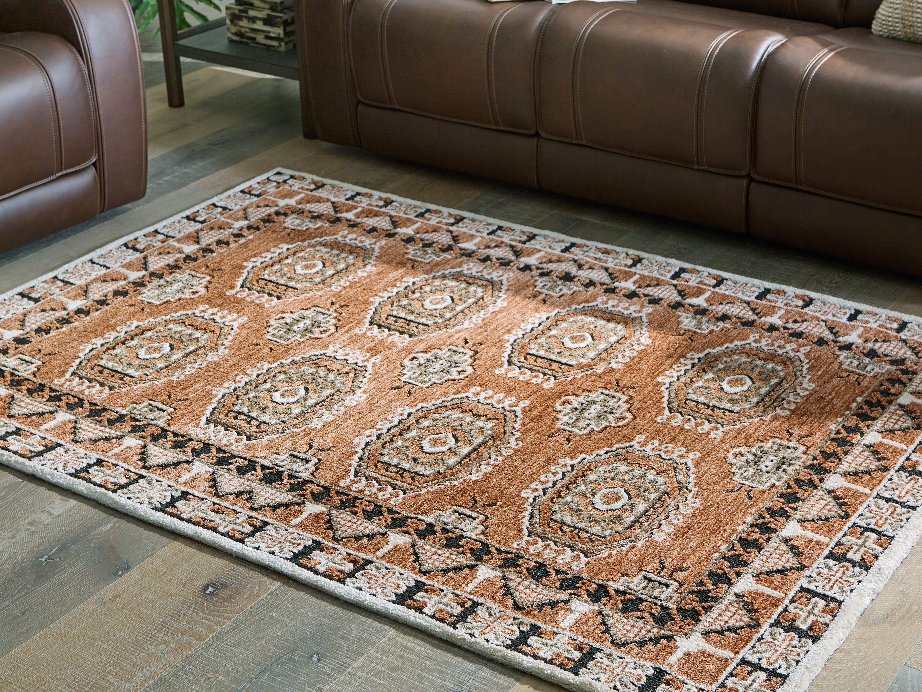 Leasing Furniture - Ashley Furniture - Qaabiz Rug - 5' x 7' Area Rug / Sienna/Ivory/Black - R407522