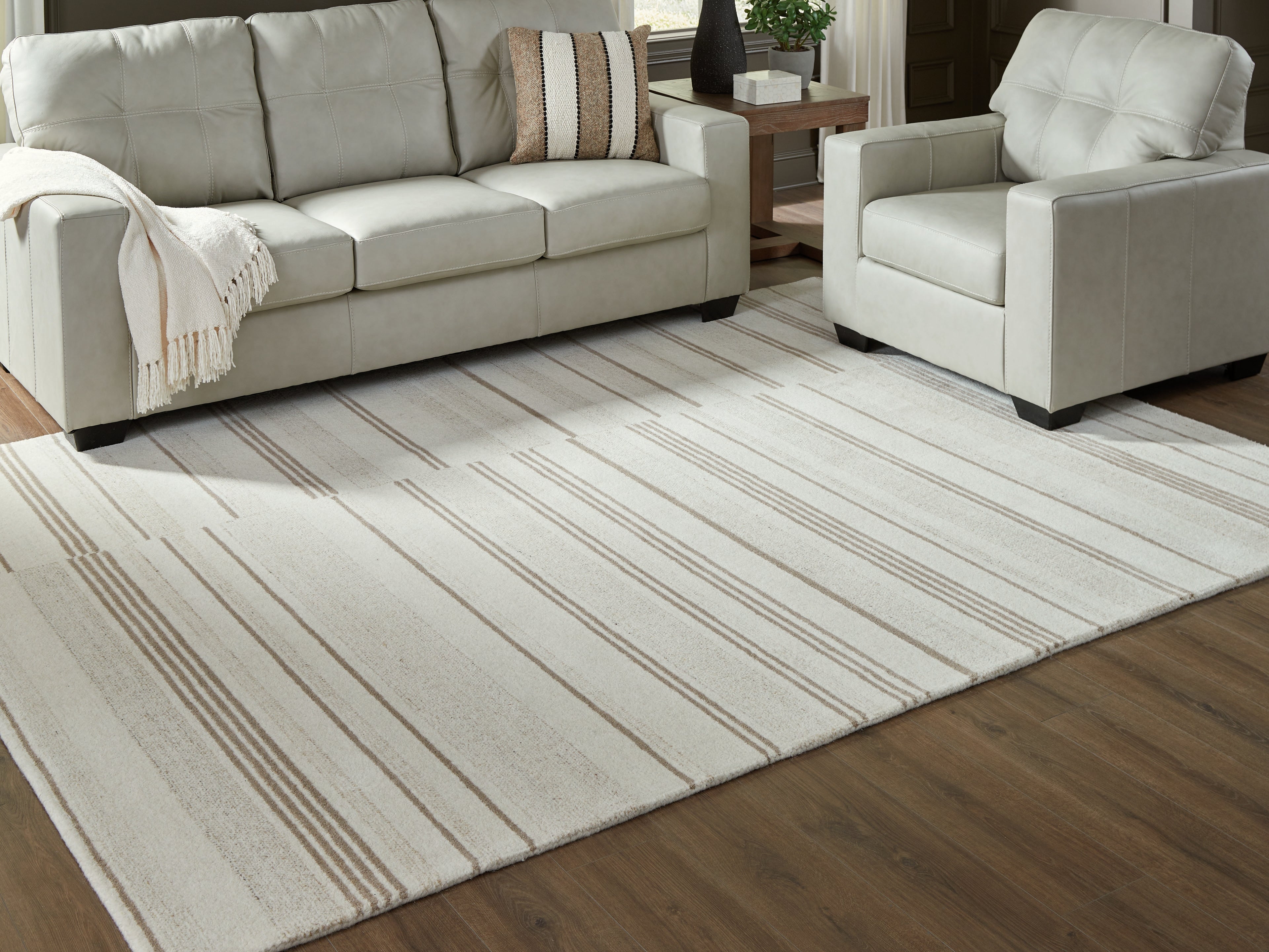 Leasing Furniture - Ashley Furniture - Gadence Rug - 7'8" x 10' Area Rug / Ivory/Tan - R407641