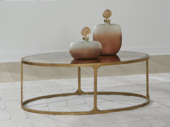 Leasing Furniture - Ashley Furniture - Korajane Coffee Table - Oval Cocktail Table / Antique Gold - T399-0