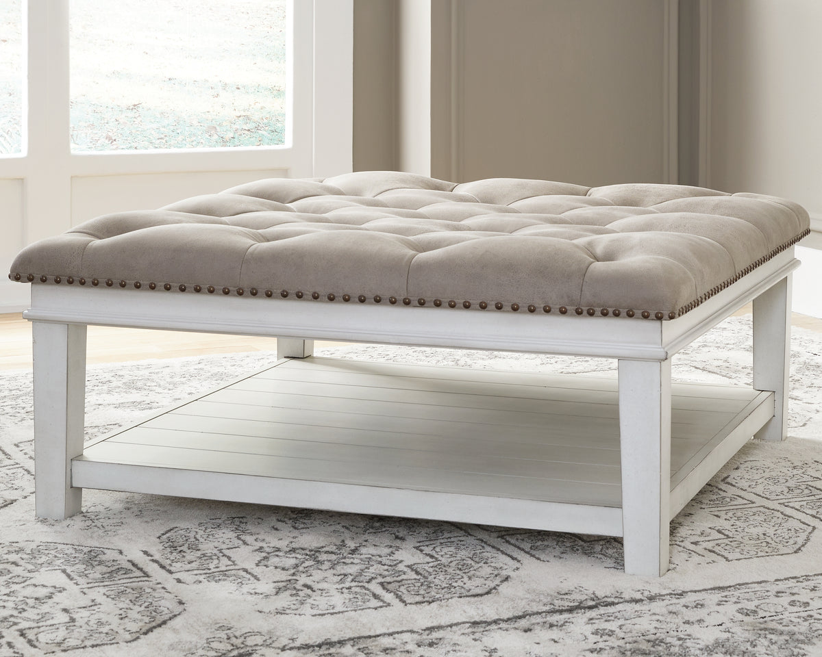 Leasing Furniture - Ashley Furniture - Kanwyn Upholstered Ottoman Coffee Table - UPH Ottoman Cocktail Table / Whitewash - T937-21